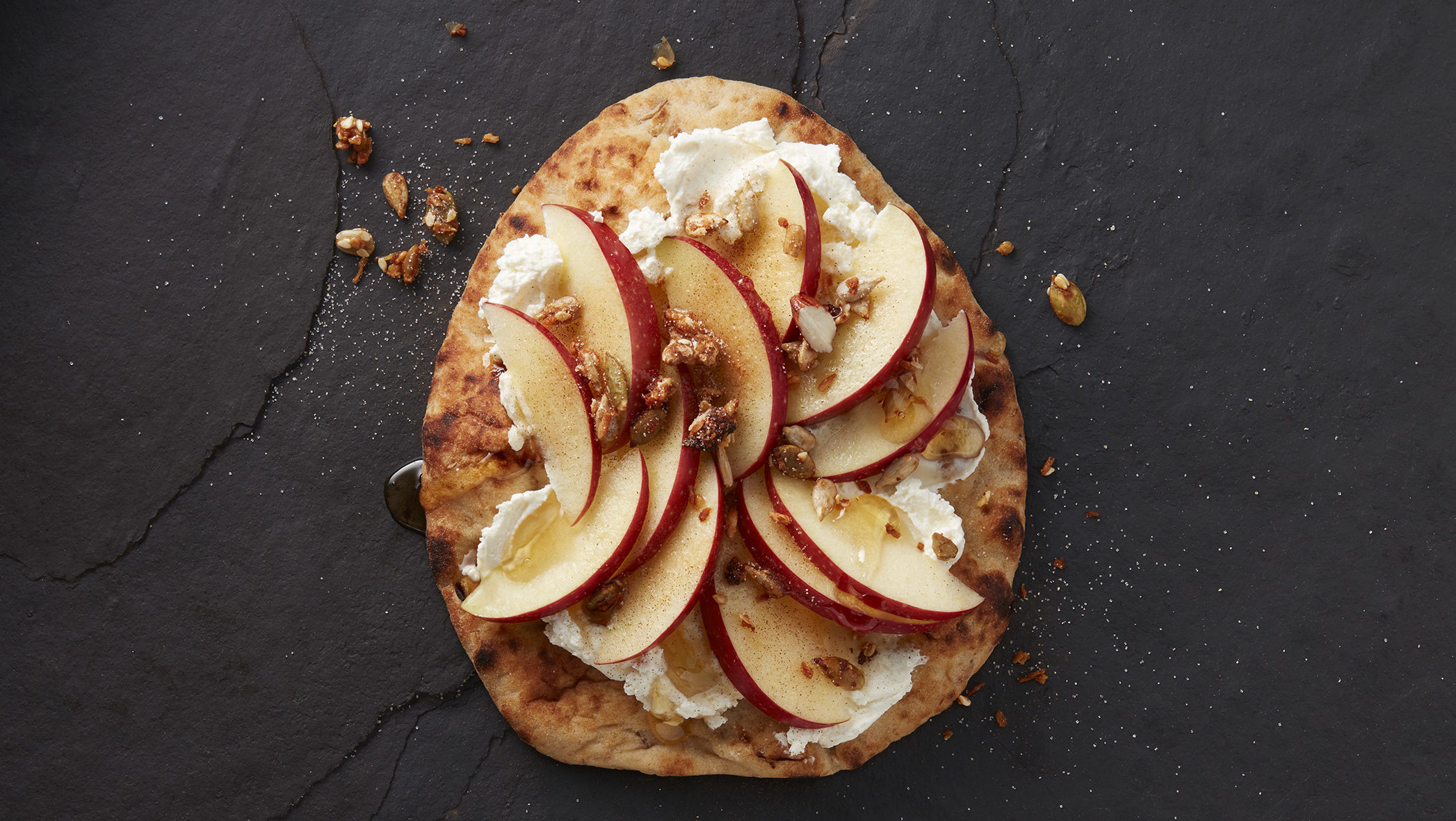 Stonefire Mini Naan Apple and Cream Cheese Toast topped with walnuts and cinnamon