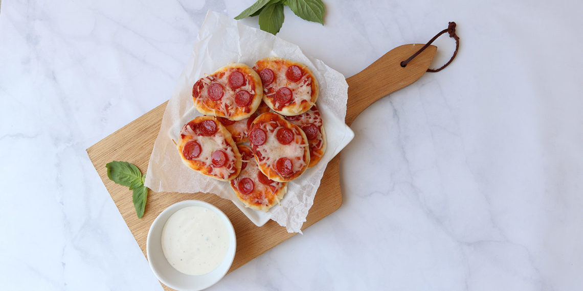 Mini Pepperoni Pizza Naan Dippers® loaded with marinara, melted cheese, and pepperoni for a fun, bite-sized snack