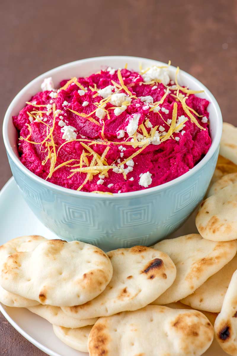 Fresh Beet and Feta Dip, topped with lemon rind and served with Stonefire® Naan Dippers®