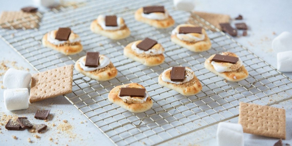 Gooey s'mores assembled on Stonefire® Naan Dippers® with melted chocolate and marshmallow, ready for a sweet treat."
