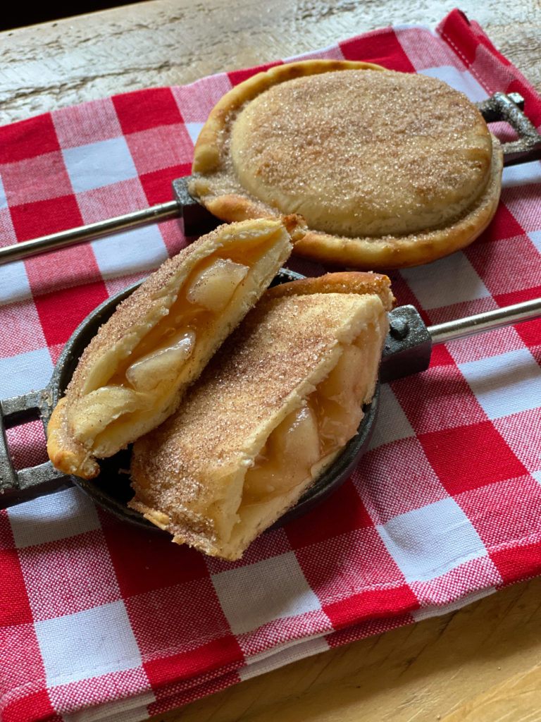 2 pie iron apple pies
